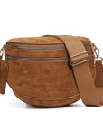 Brown leather crossbody bag on a white background
